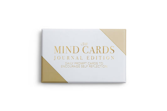 A box of 'Mind Cards: Journal Edition' with a white and gold color scheme, titled Encourage Self-Reflection.
